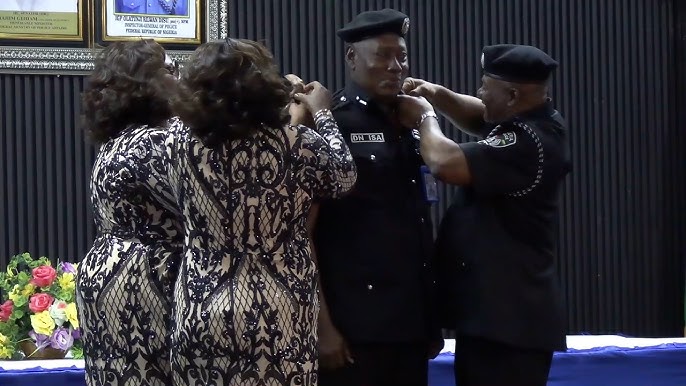 VIDEO: Drama as Senior Police Officer Is Decorated by His Two Wives