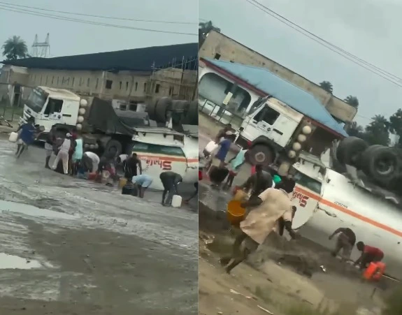 VIDEO: Warri Residents Scoop Petrol From a Broken-Down Tanker